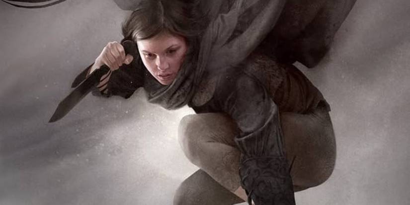 Vin from Mistborn with her cape flying and a knife in her hand 