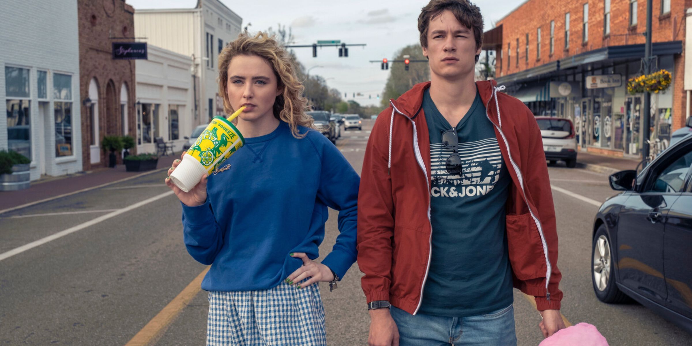 Margaret and Mark stand in the middle of the street with lemonade and cotton candy in The Map Of Tiny Perfect Things