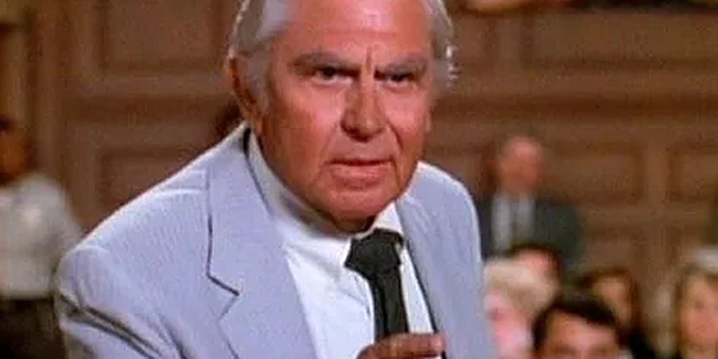 Matlock's Andy Griffith pointing at someone off camera in a courtroom