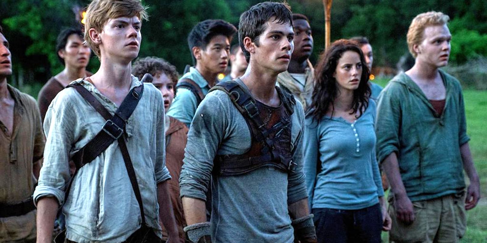 The Gladers stand together looking off into the distance in The Maze Runner