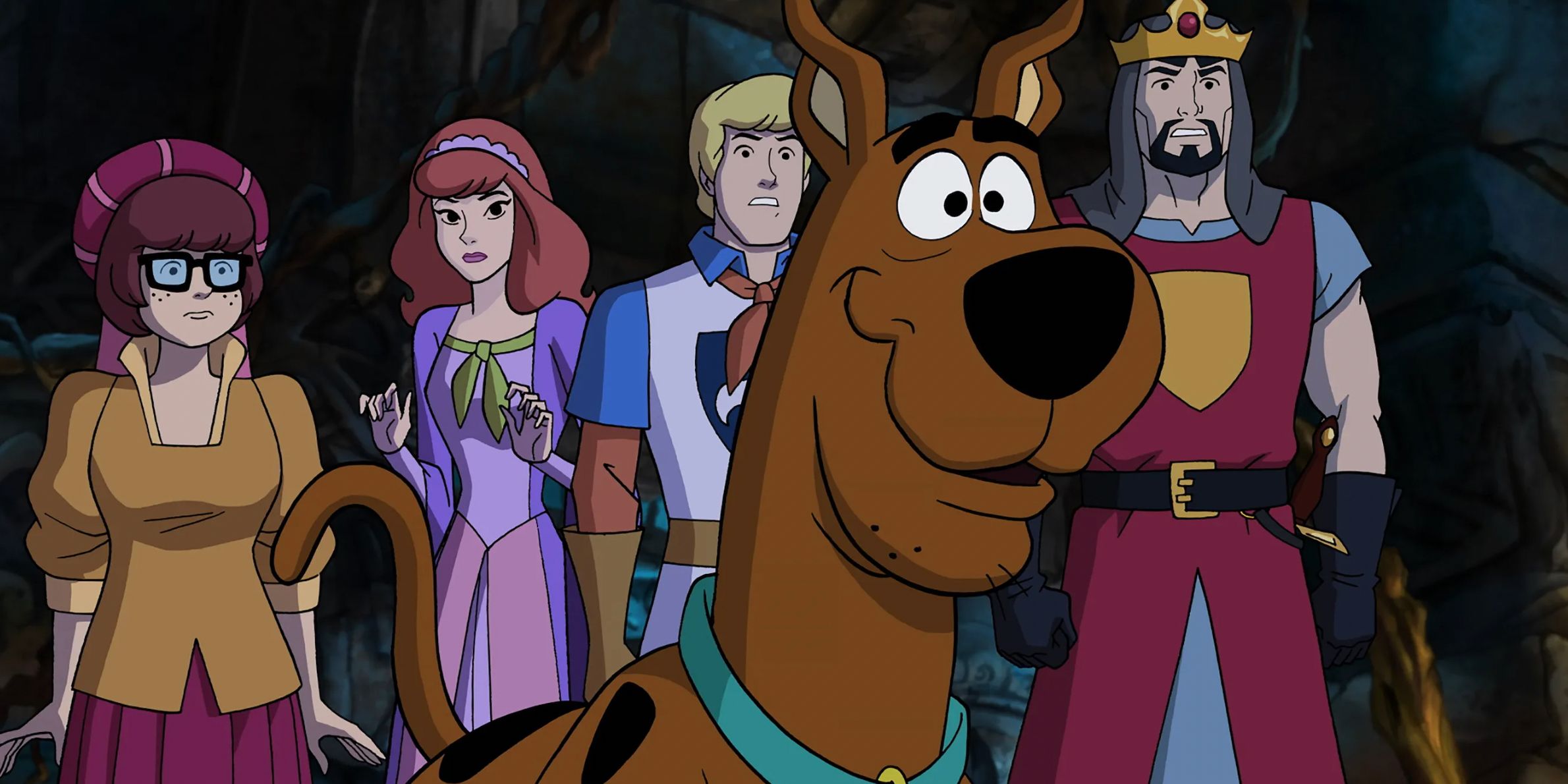Members of the Scooby gang in Arthurian clothes in The Sword and the Scoob