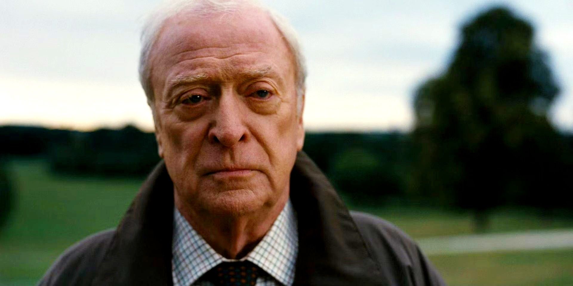 Alfred (Michael Caine) looking worried in The Dark Knight