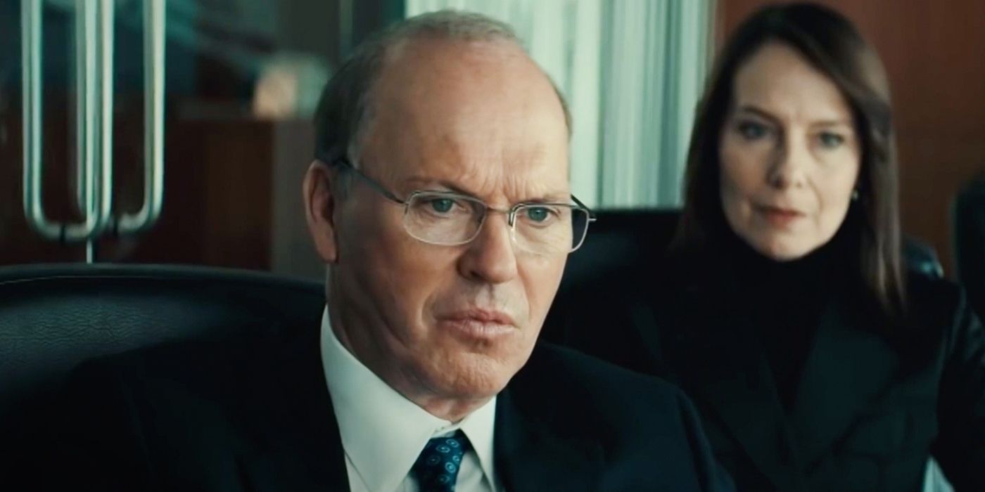 Michael Keaton and Amy Ryan looking serious in Worth