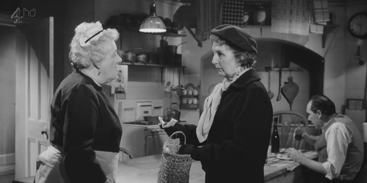 Miss Marple talks with a woman in the kitchen in Murder She Said.