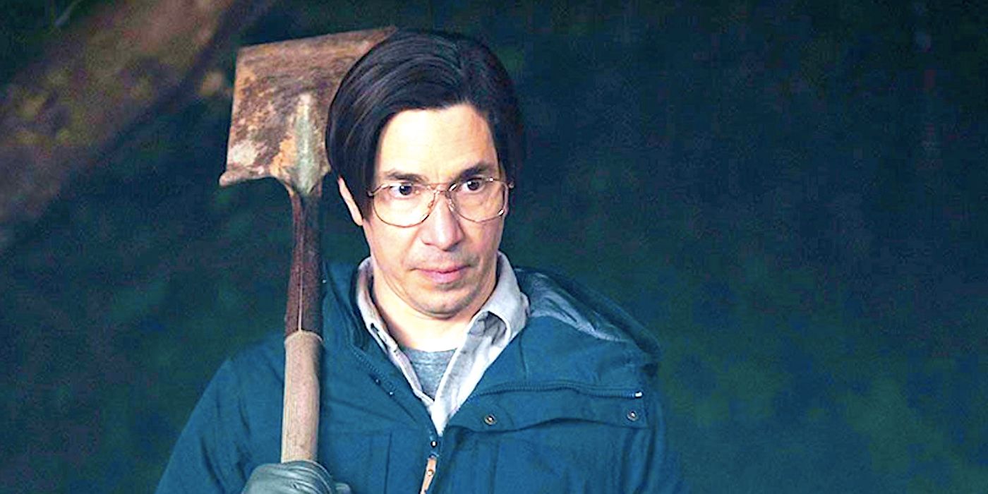 Mr. Bratt possessed by Harold Biddle and holding a shovel with a menacing stare in Goosebumps 2023