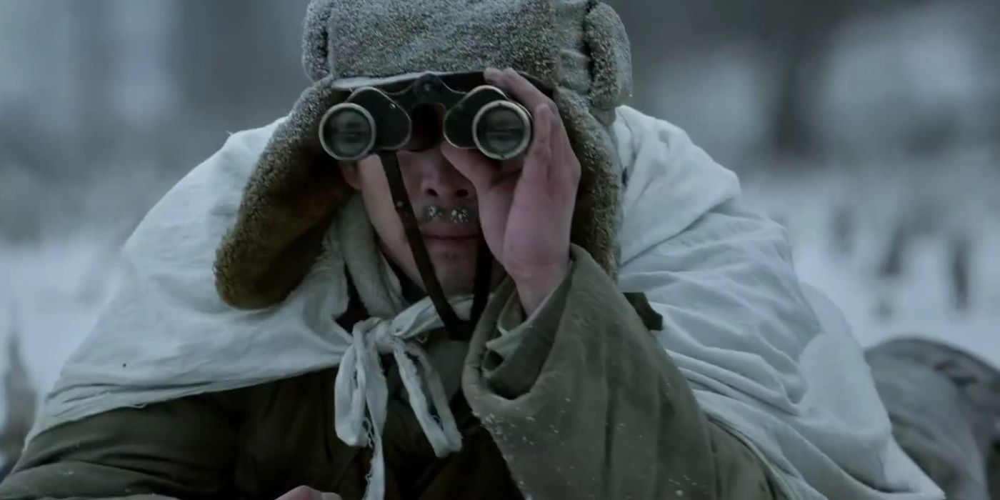 A man with binoculars in Snipers.