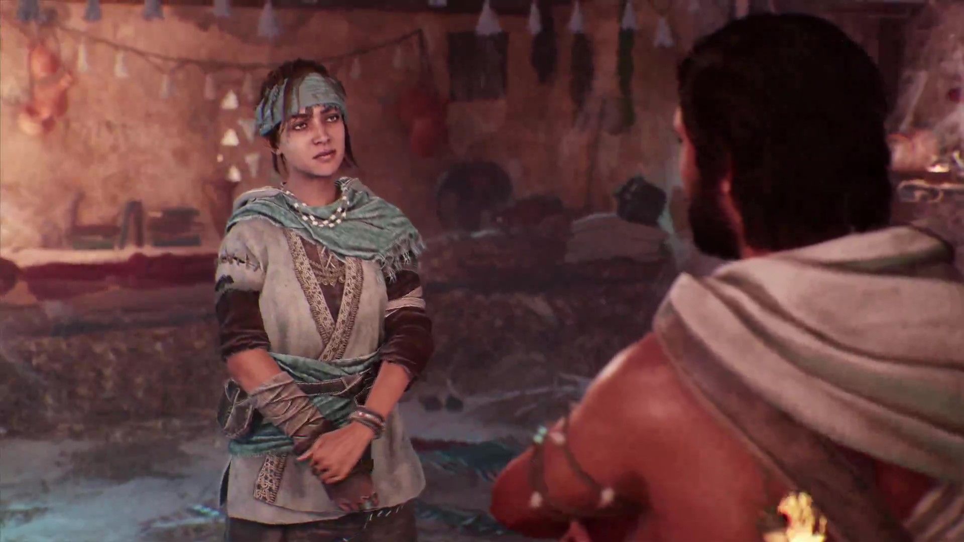Nehal standing in a room facing Basim in Assassin&rsquo;s Creed Mirage