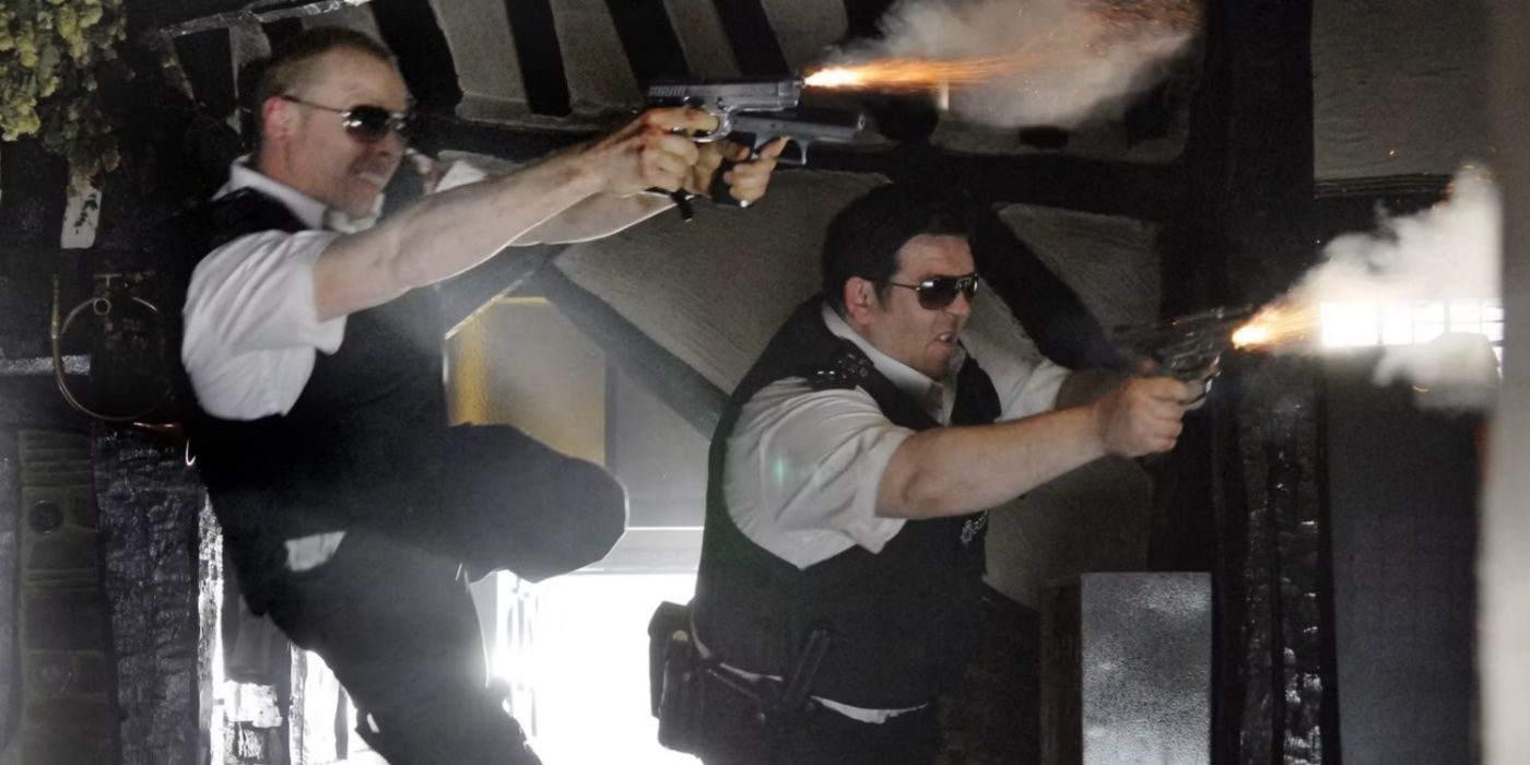 Nicholas and Danny jumping through the air shooting two guns each in Hot Fuzz's final shootout.