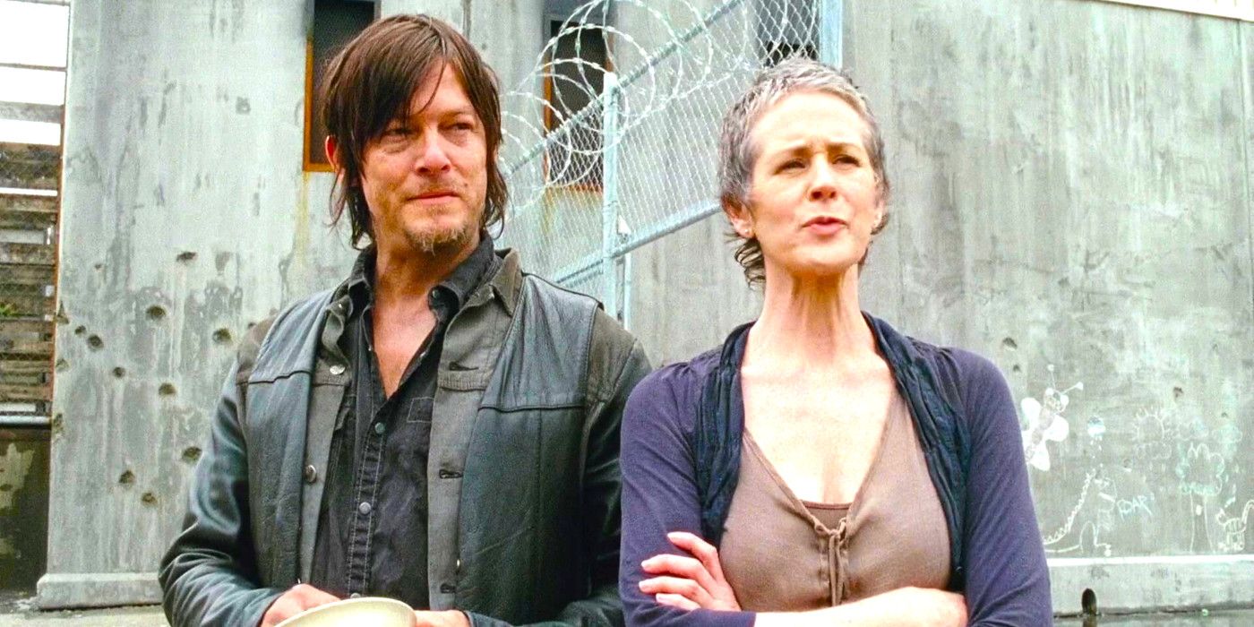 Norman Reedus and Melissa McBride standing side by side in The Walking Dead season 4