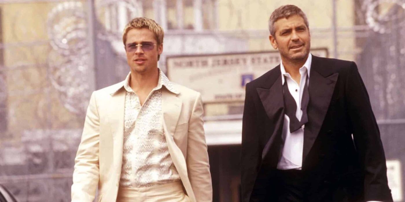 Brad Pitt and George Clooney looking cool in Ocean's Eleven.