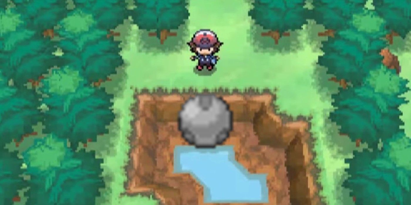 A player character approaching the center of the Great Crater in Pokémon Black and White with the &lsquo;God Stone&rsquo; item sprite.