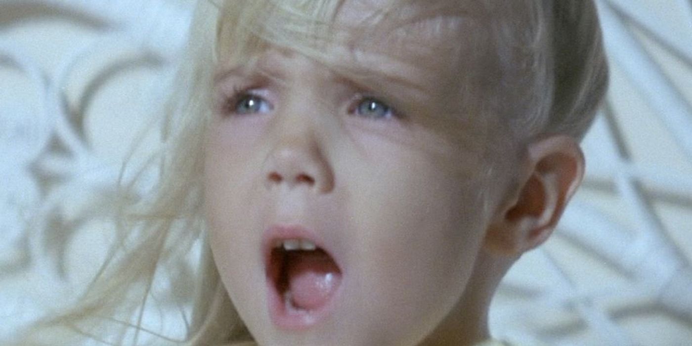 Carol Anne (Heather O&rsquo;Rourke) mouth agape in Poltergeist