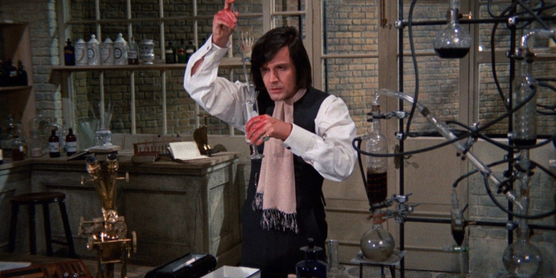 Ralph Bates as Dr. Jekyll in a laboratory in Dr. Jekyll and Sister Hyde.