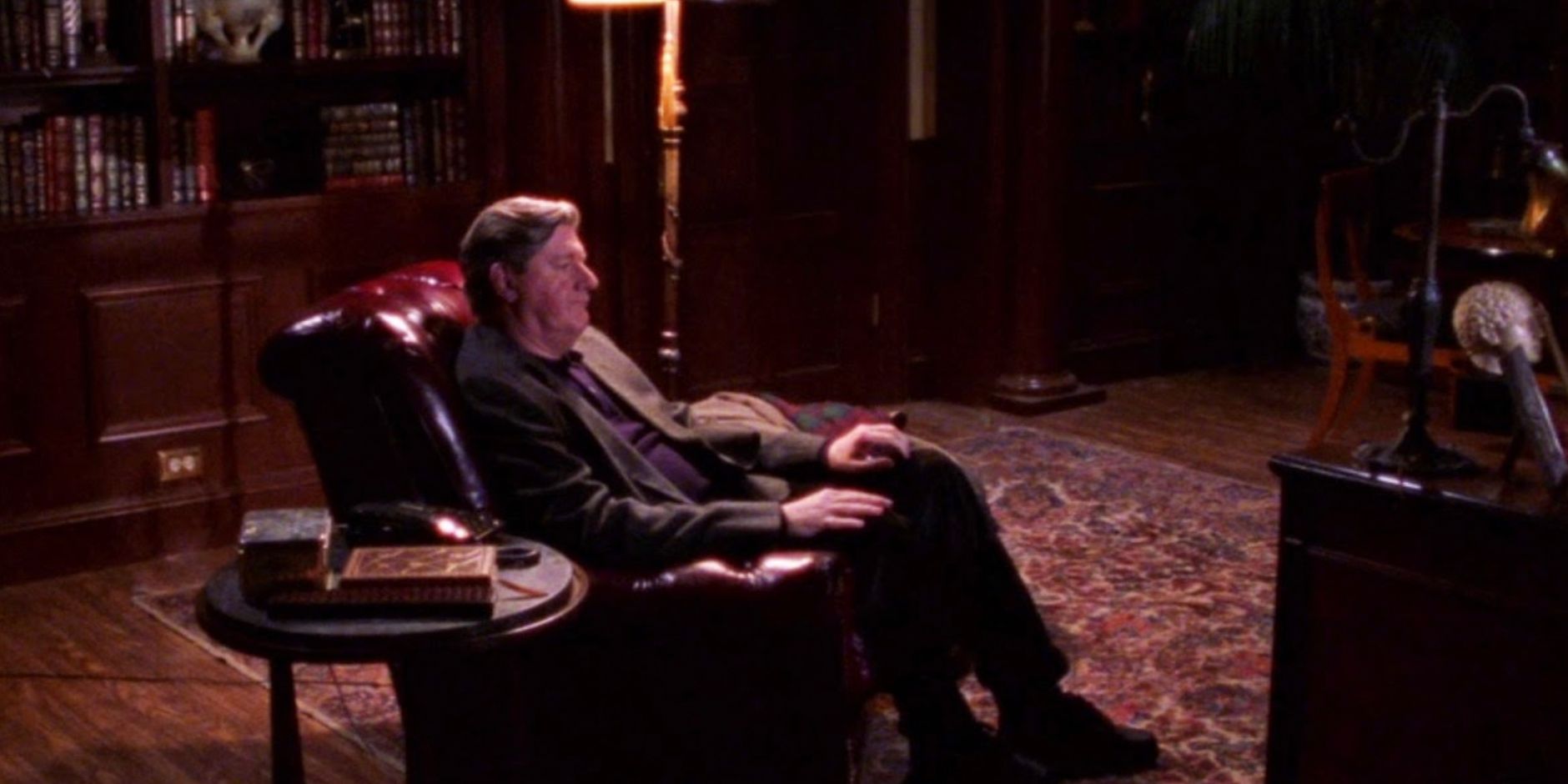 Richard sitting alone in his study in Gilmore Girls