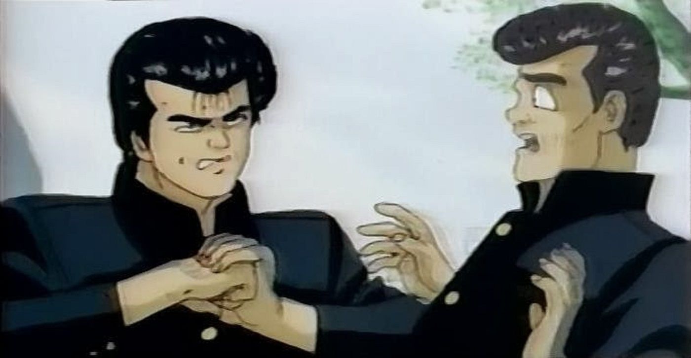 Maeda Taison angrily cracking his knuckles, startling his friend, in Rokudenashi Blues.