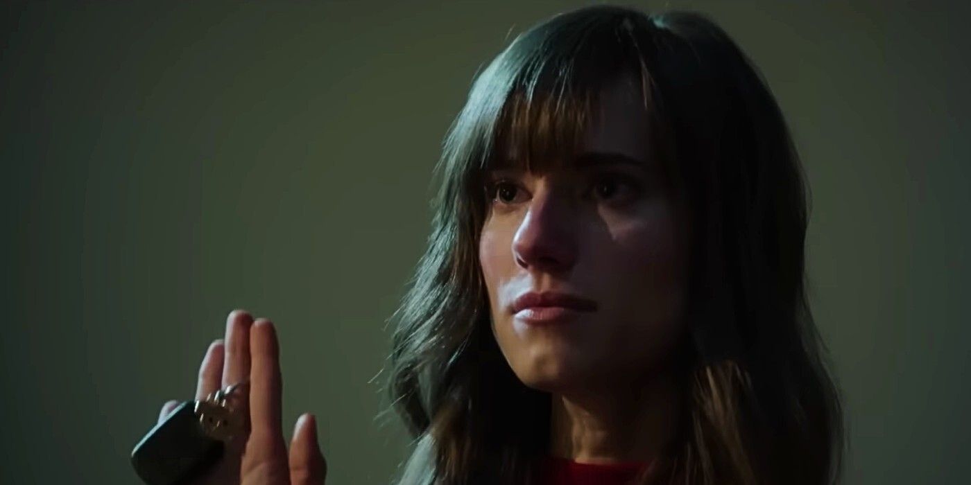 A screencap from Get Out of Allison Williams' Rose frowning while holding up some car keys