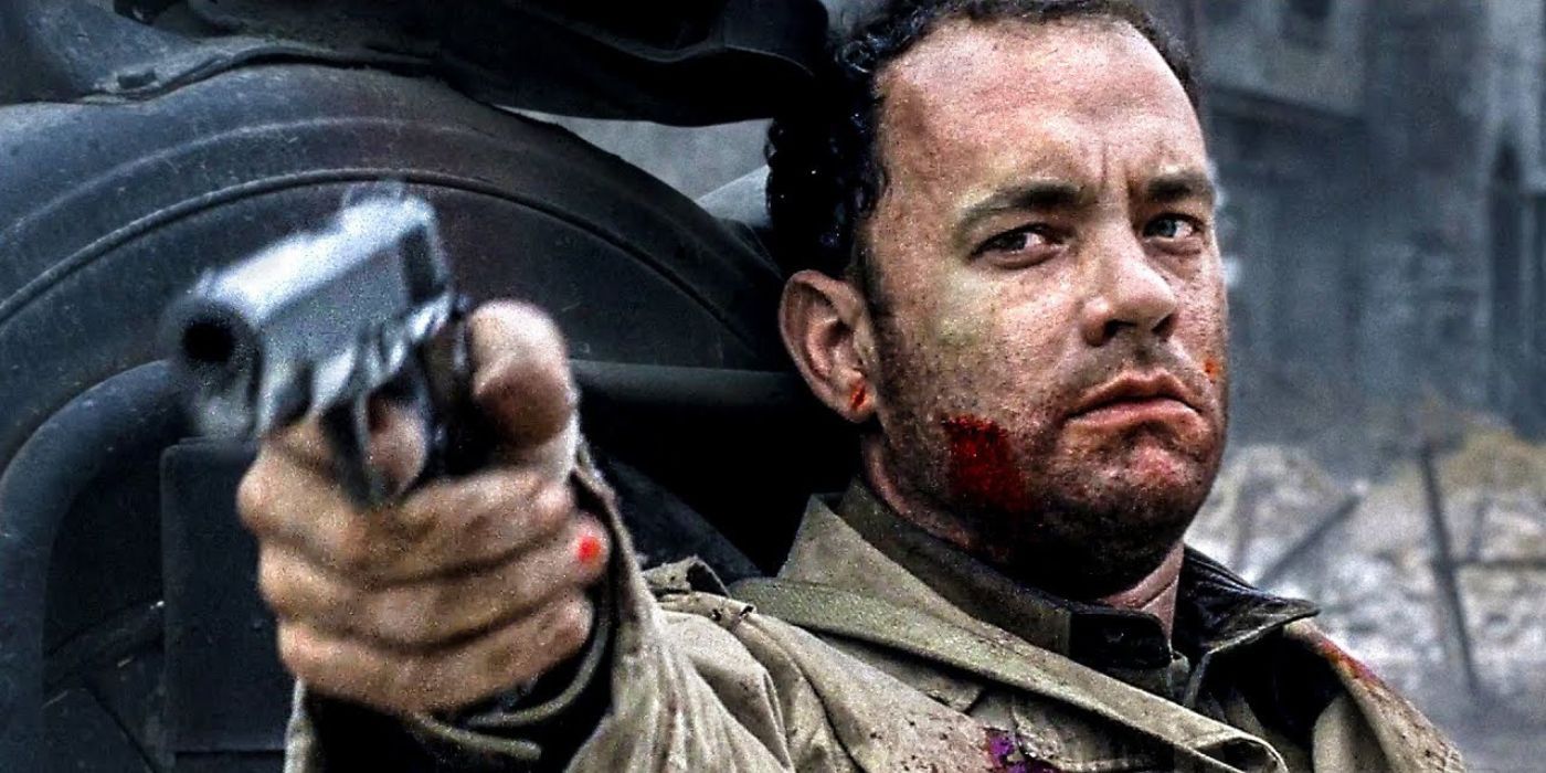 Tom Hanks aiming his gun as Captain Miller in Saving Private Ryan