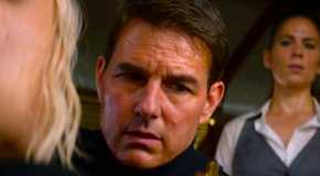 Tom Cruise as Ethan Hunt looking down at the Entity key in Mission: Impossible - Dead Reckoning Part One