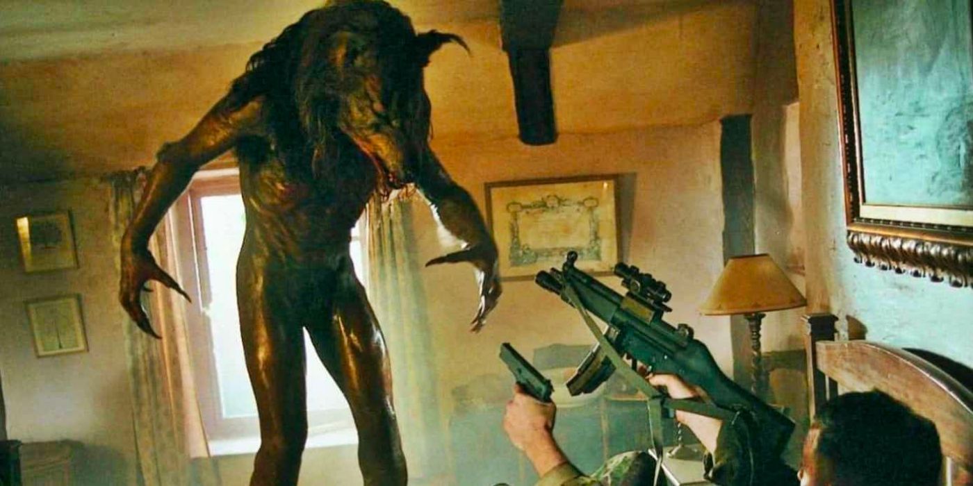 Guns are pointed at a werewolf in Dog Soldiers