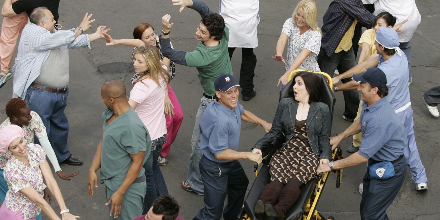 Scrubs ensemble cast performing in the parking lot in My Musical Episode