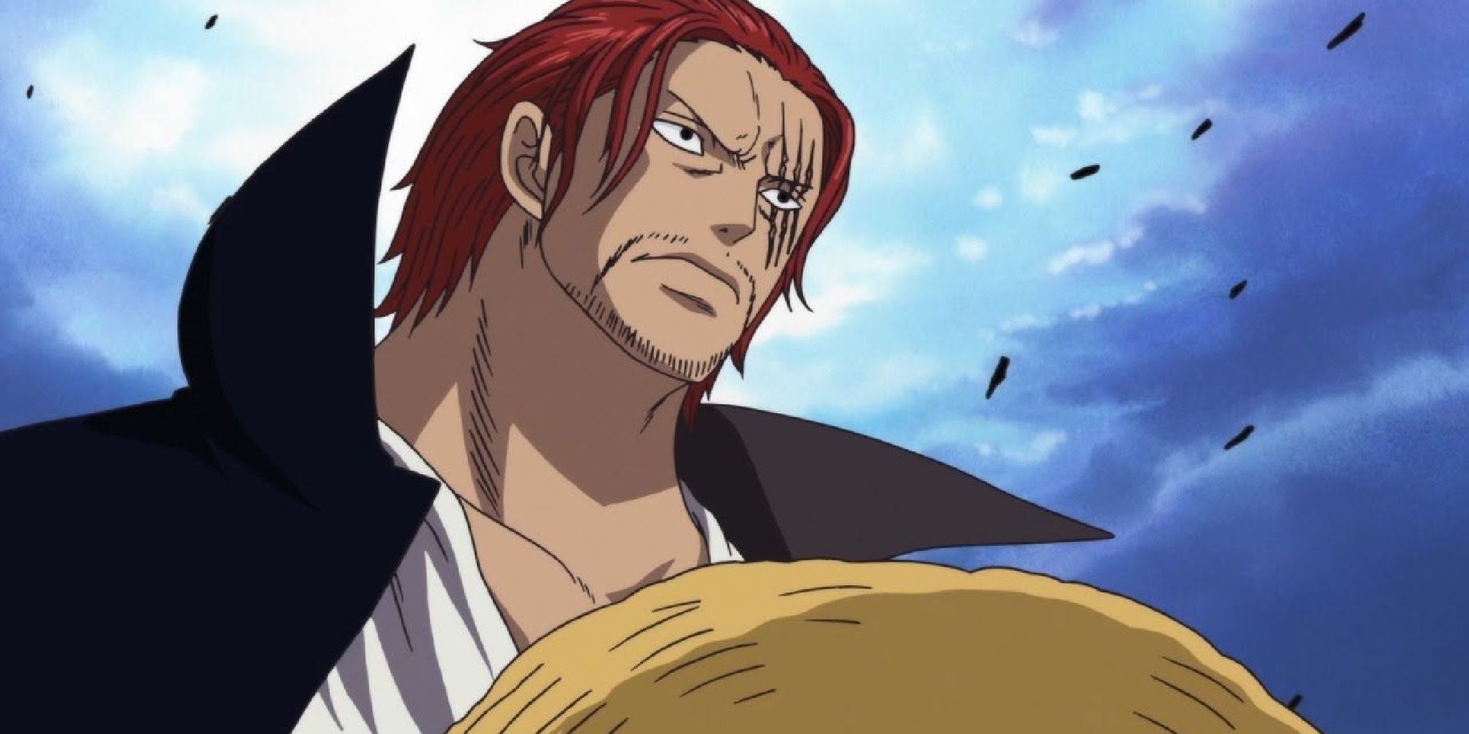 Shanks from One Piece looking serious with a hat in his hand.