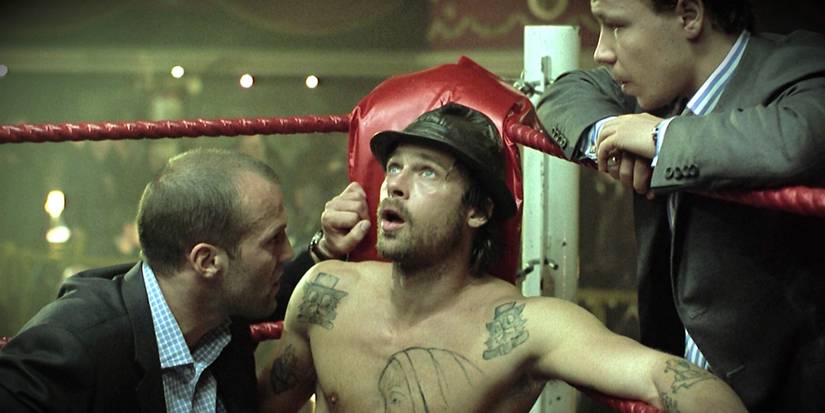 Jason Statham as Turkish, Brad Pitt as Mickey O'Neil, and Stephen Graham as Tommy in Snatch.