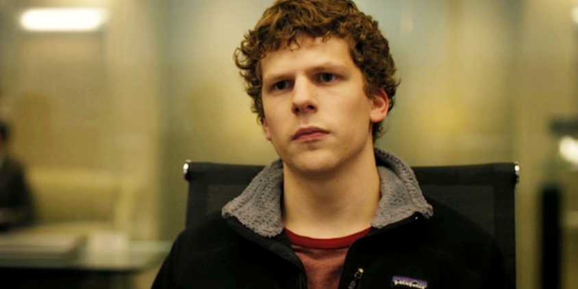Jesse Eisenberg as Mark Zuckerberg looking angry in The Social Network.