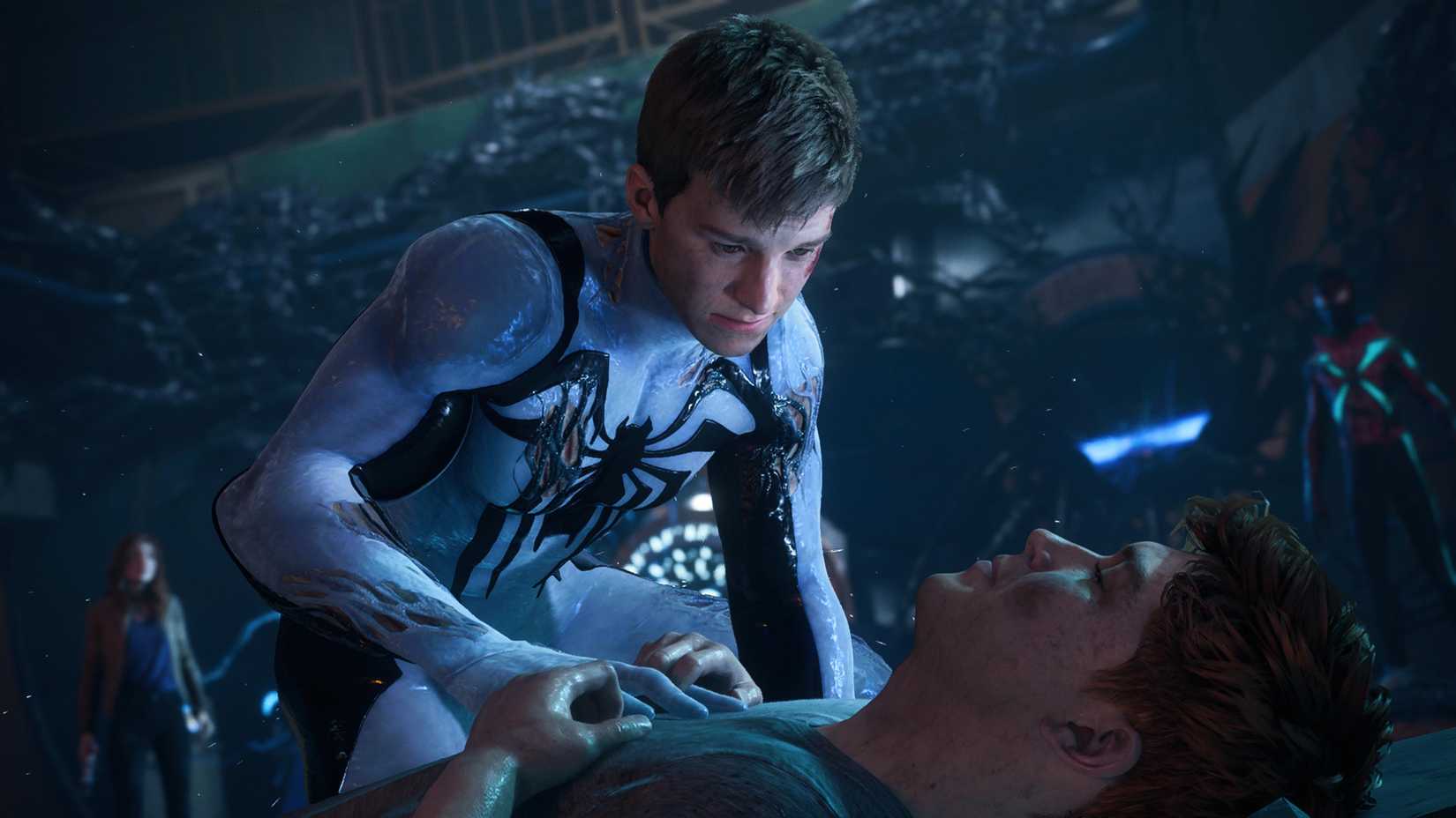 Peter Parker with his mask off crouched over a dying Harry Osborn.
