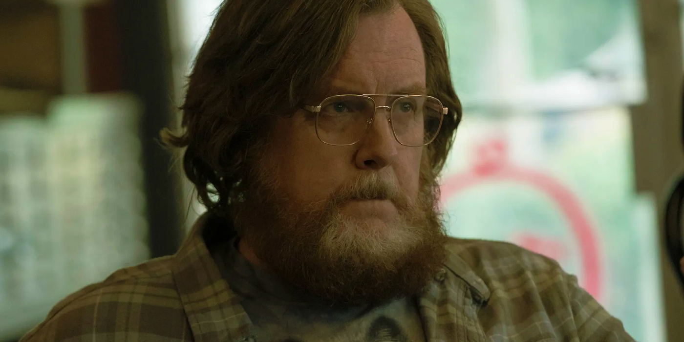 Steve Agee as John Economos in Peacemaker