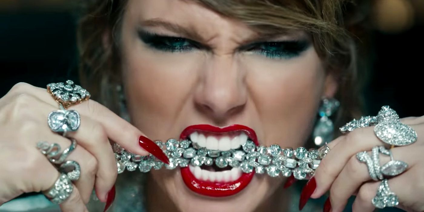 Taylor Swift Biting a Necklace in the Look What You Made Me Do Video