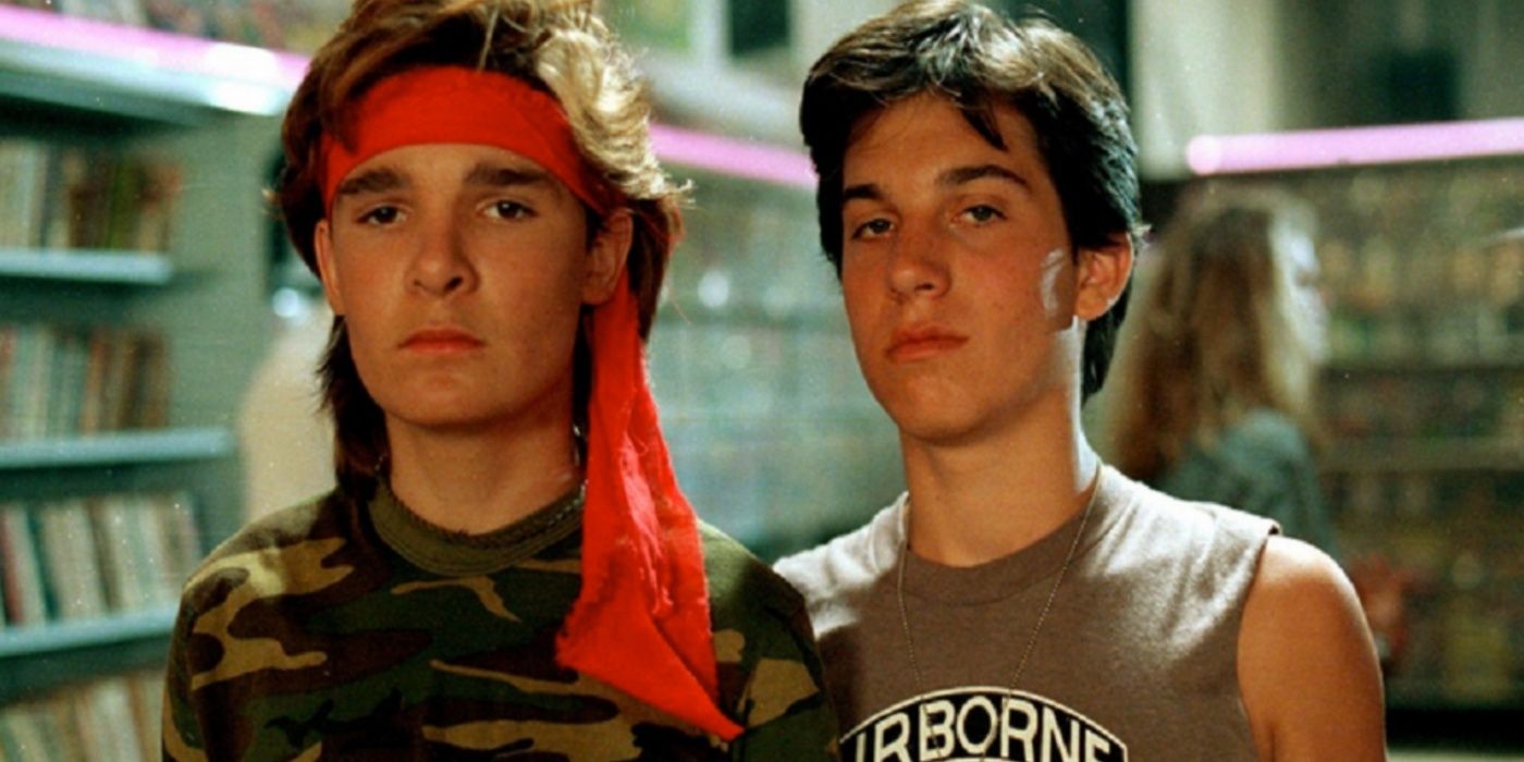 The Frog Brothers (Jamison Newlander and Corey Feldman) posing in the comic book store in The Lost Boys.