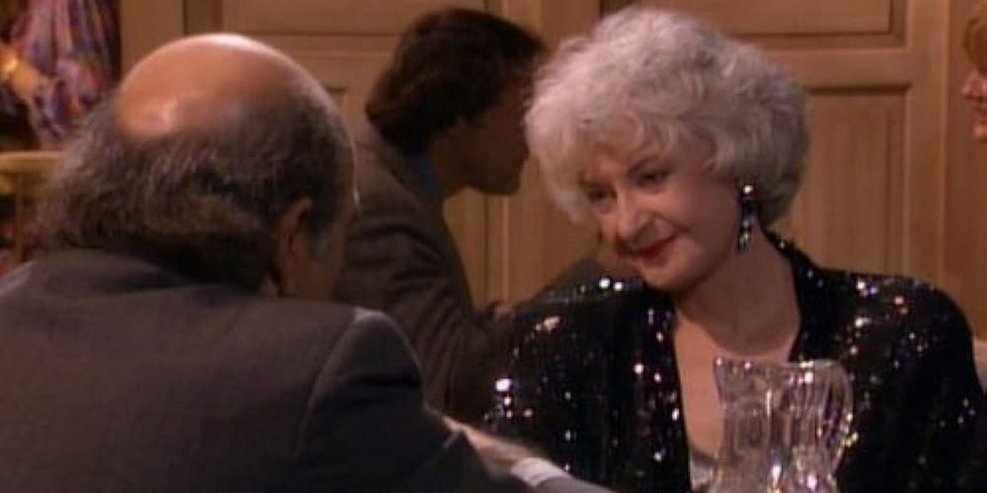 Dorothy looks across the table at her date in The Golden Girls