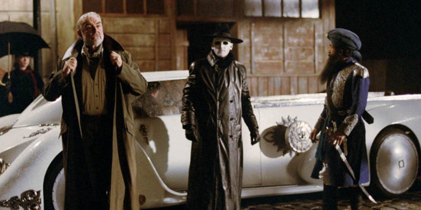 The League of Extraordinary Gentleman in front of a classic car