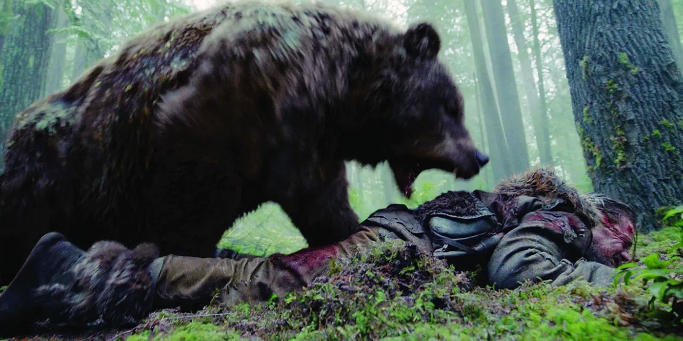 Leonardo DiCaprio as Hugh Glass gets mauled by a bear in The Revenant.
