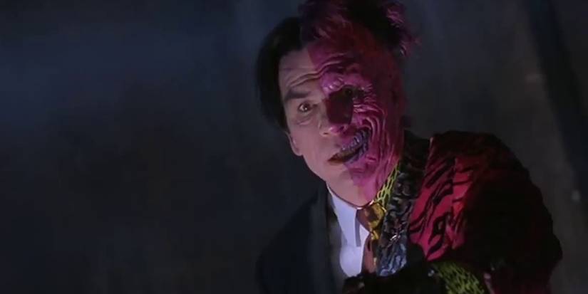 Tommy Lee Jones as Two-Face looking confused in Batman Forever