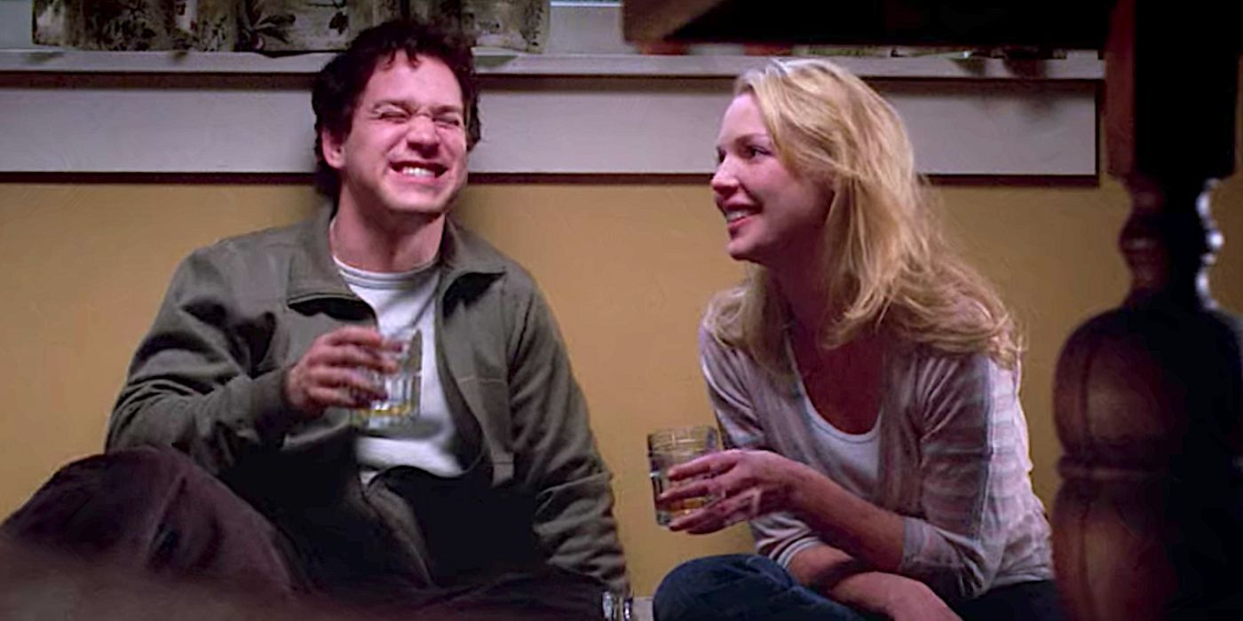 Izzie and George are laughing.