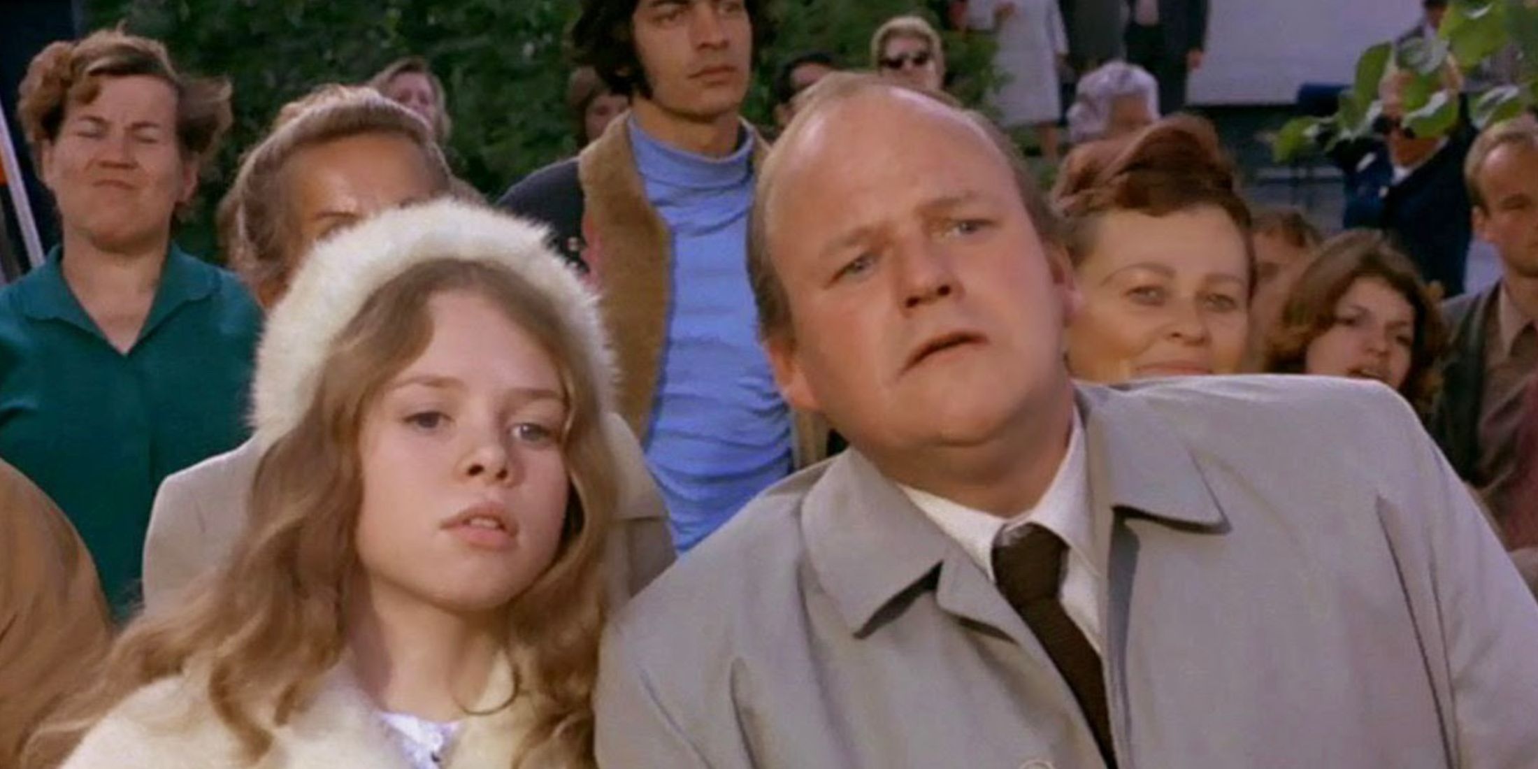 Veruca and her father in Willy Wonka and the Chocolate Factory