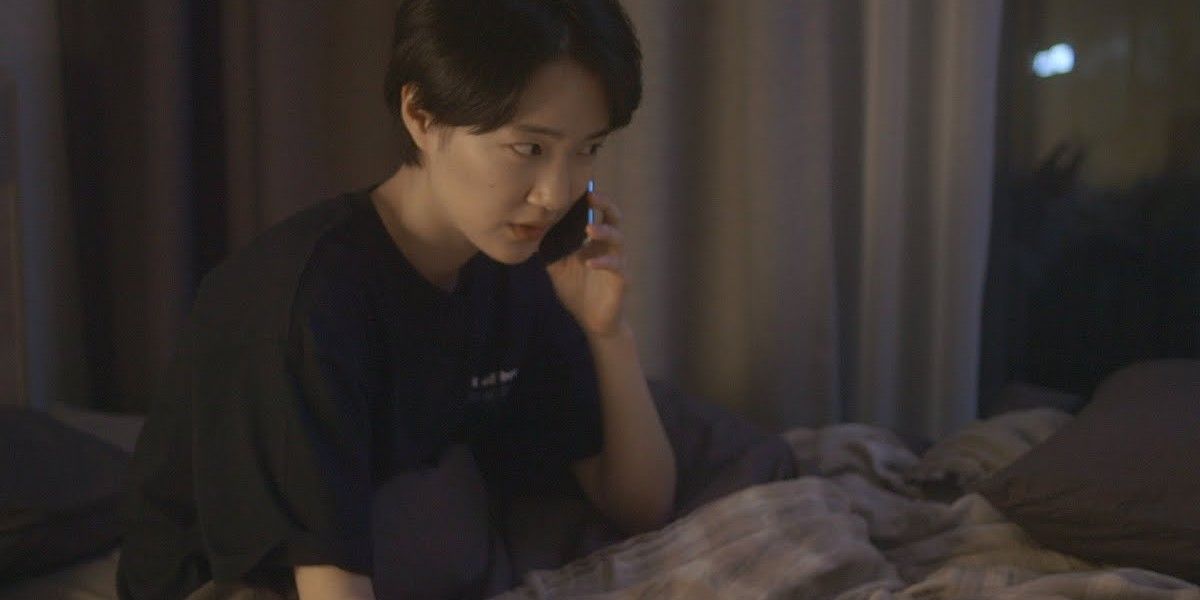 Woman talking on the phone in K-drama Out of Breath