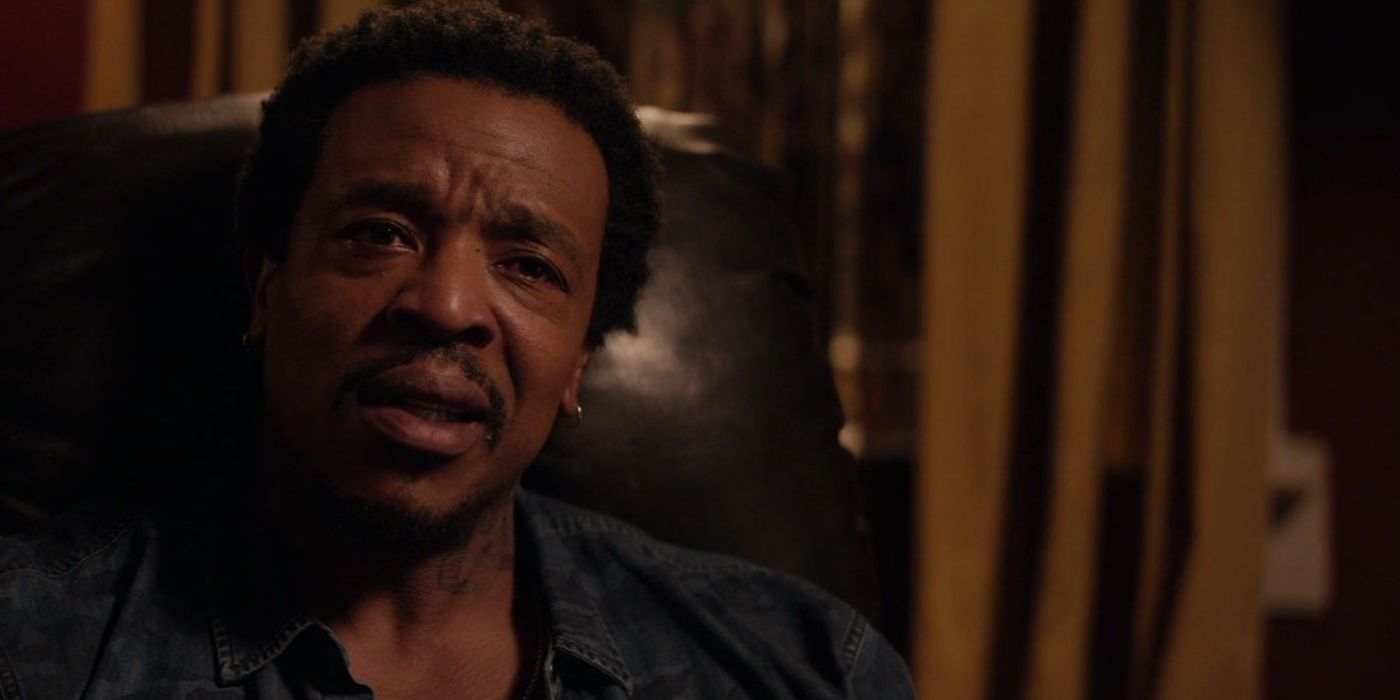 Russell Hornsby as Maverick looking confused in The Hate u Give