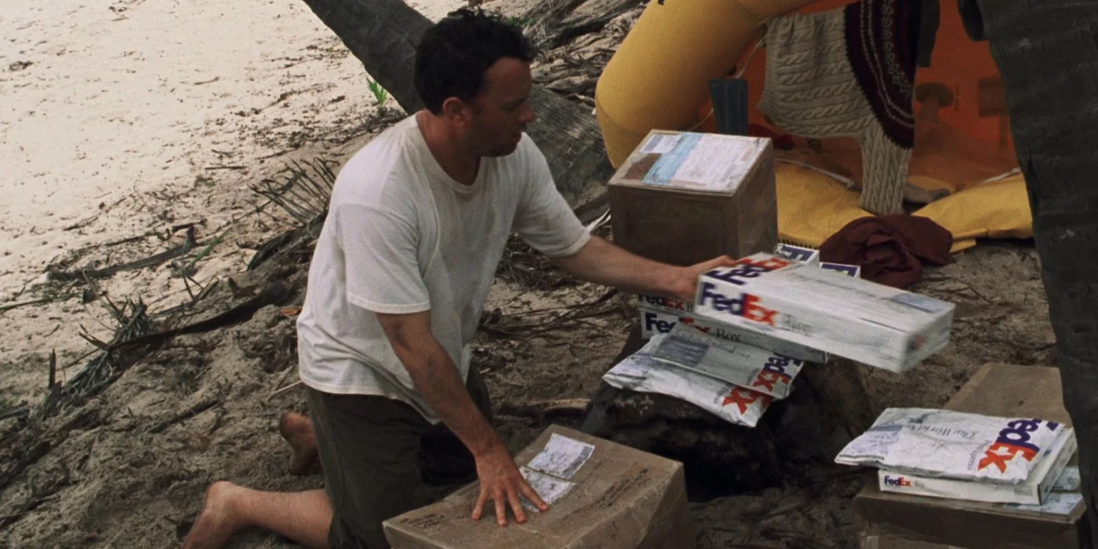 Tom Hanks sorting through FedEx packages in Cast Away.