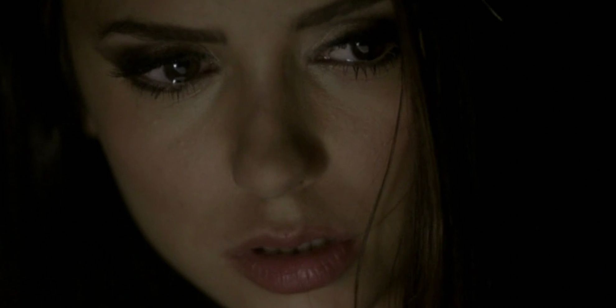 A closeup of Katherine in the tomb in the Vampire Diaries episode Katerina