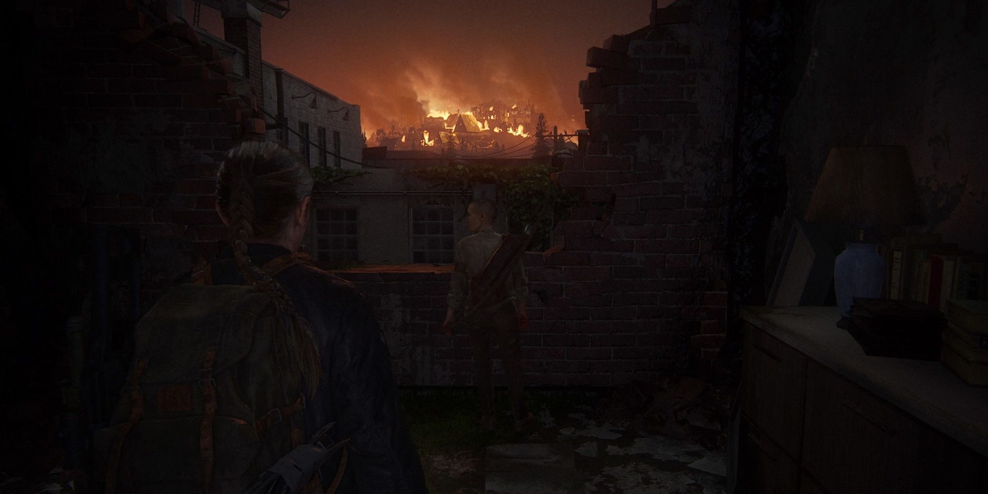Abby and Lev overlook the battle in The Last of Us Part II