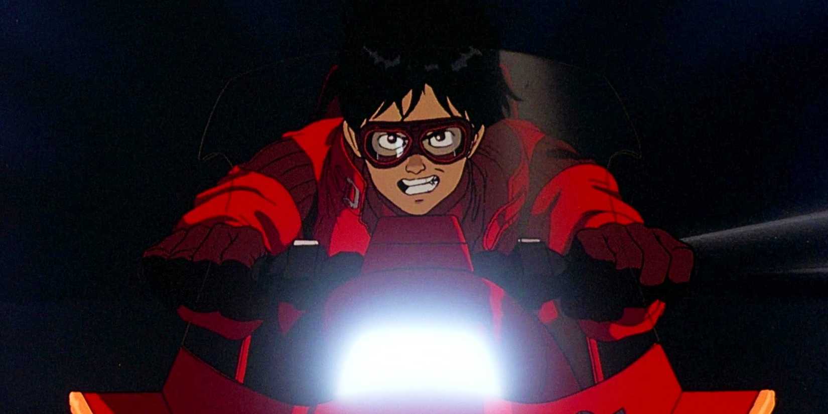 Akira's Kaneda riding his bike and looking determined.