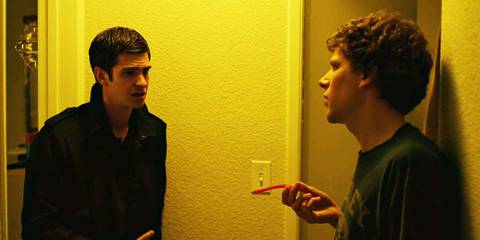 Andrew Garfield as Eduardo Saverin and Jesse Eisenberg as Mark Zuckerberg in The Social Network
