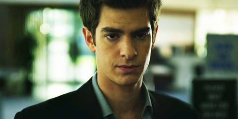 Andrew Garfield as Eduardo Saverin looking serious in The Social Network