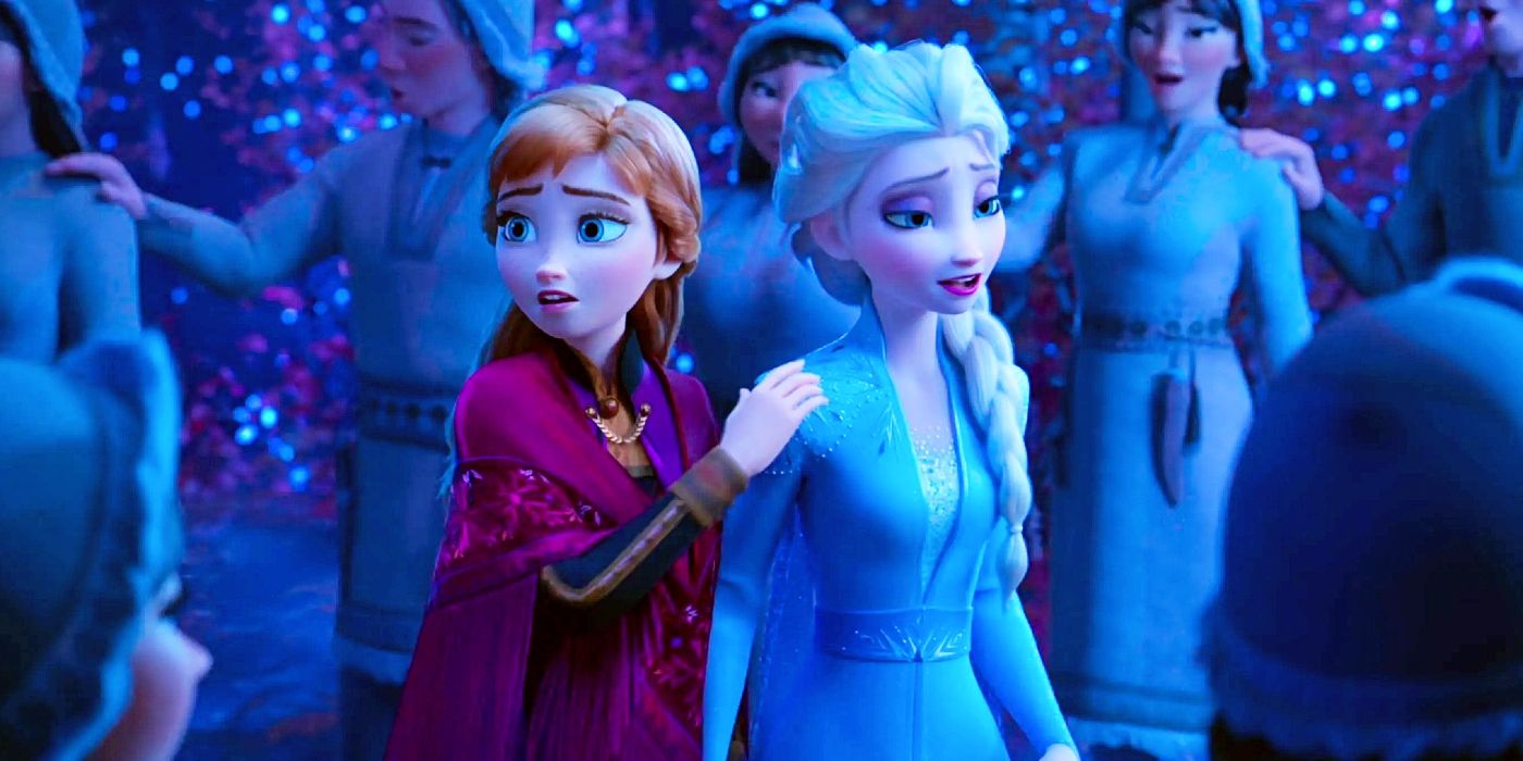 Anna has a hand on Elsa's shoulder while surrounded by singing villagers in Frozen .2.