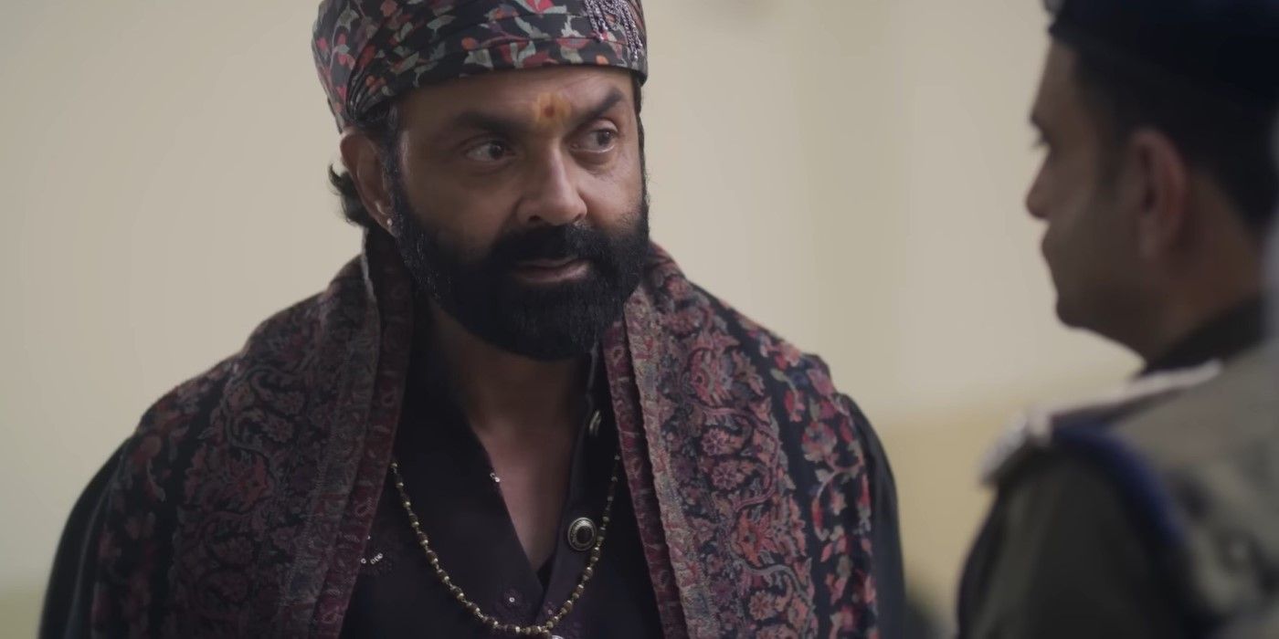 Baba looking angry at someone in Aashram.