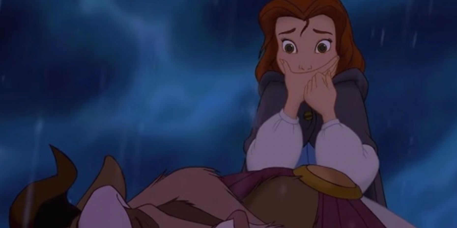 Belle watches a dying Beast in Beauty and the Beast