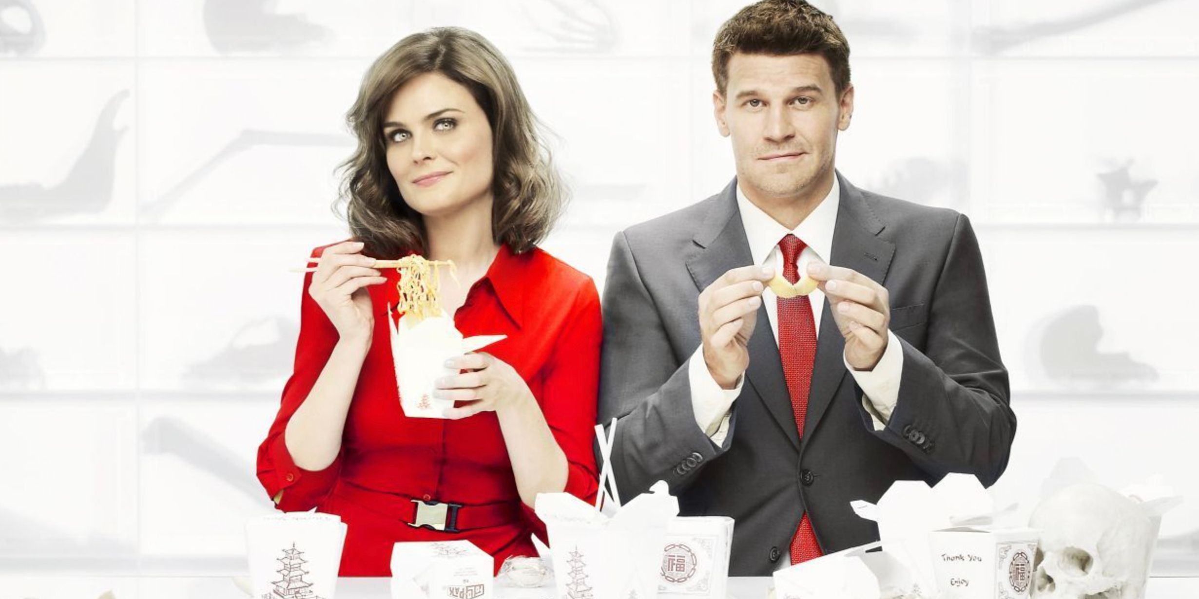 Bennan and Booth eating takeout in a Bones promotional image