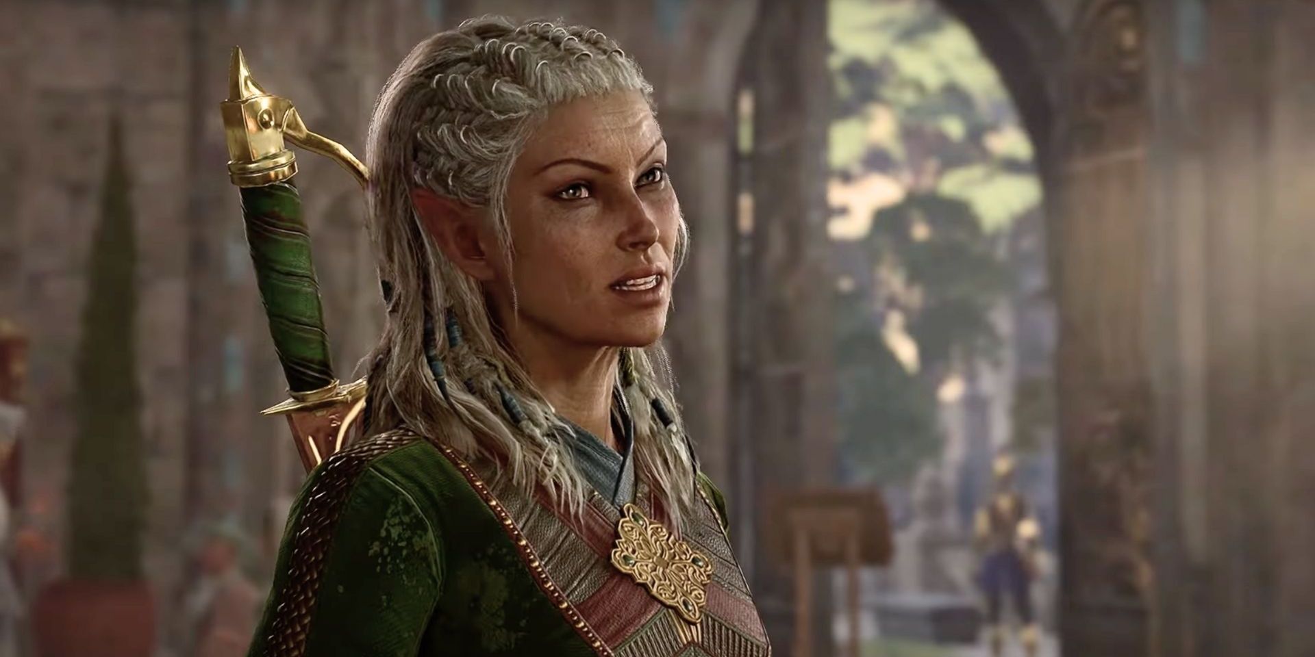 Jaheira grits her teeth near a great stone doorway in a screenshot from Baldur's Gate 3.